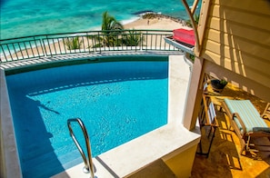 Outdoor pool, pool loungers - White Sands Beach Condos (St. Lawrence Gap)