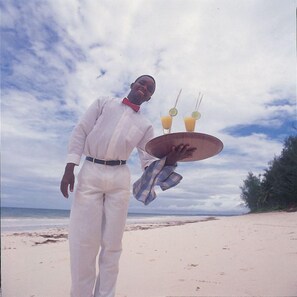On the beach, white sand, beach towels, surfing - Baobab Sea Lodge (Kilifi)