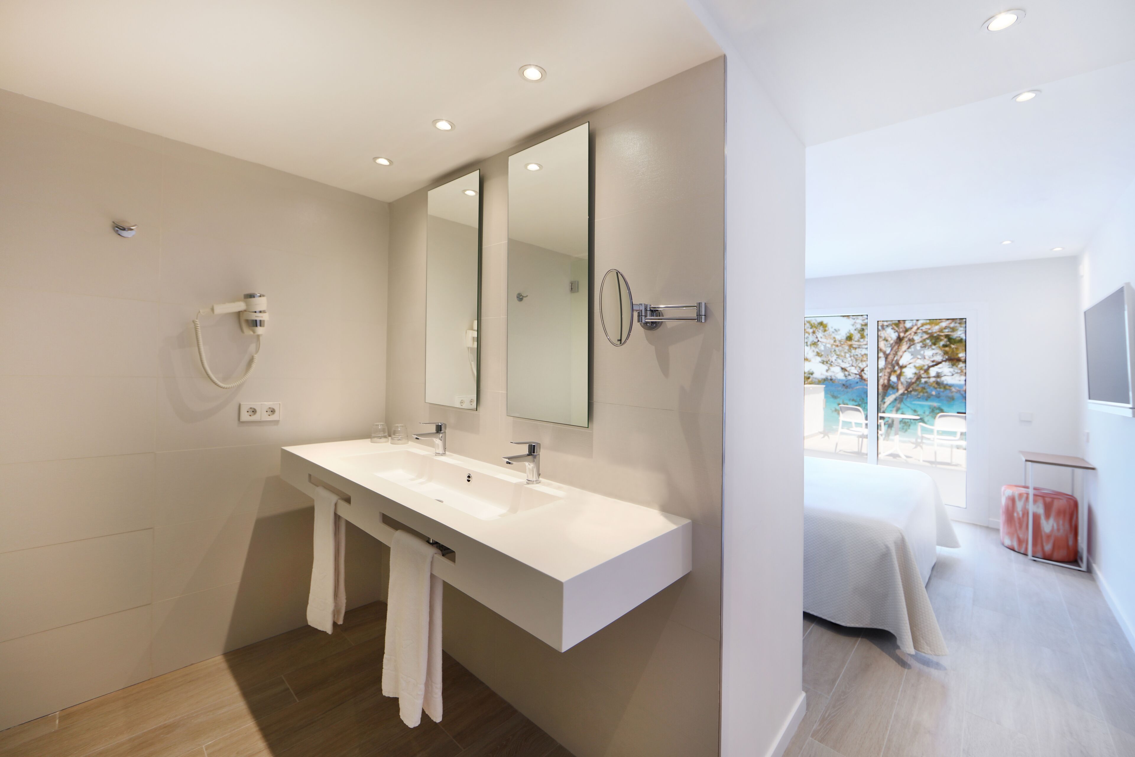 shower, eco-friendly toiletries, hair dryer, towels