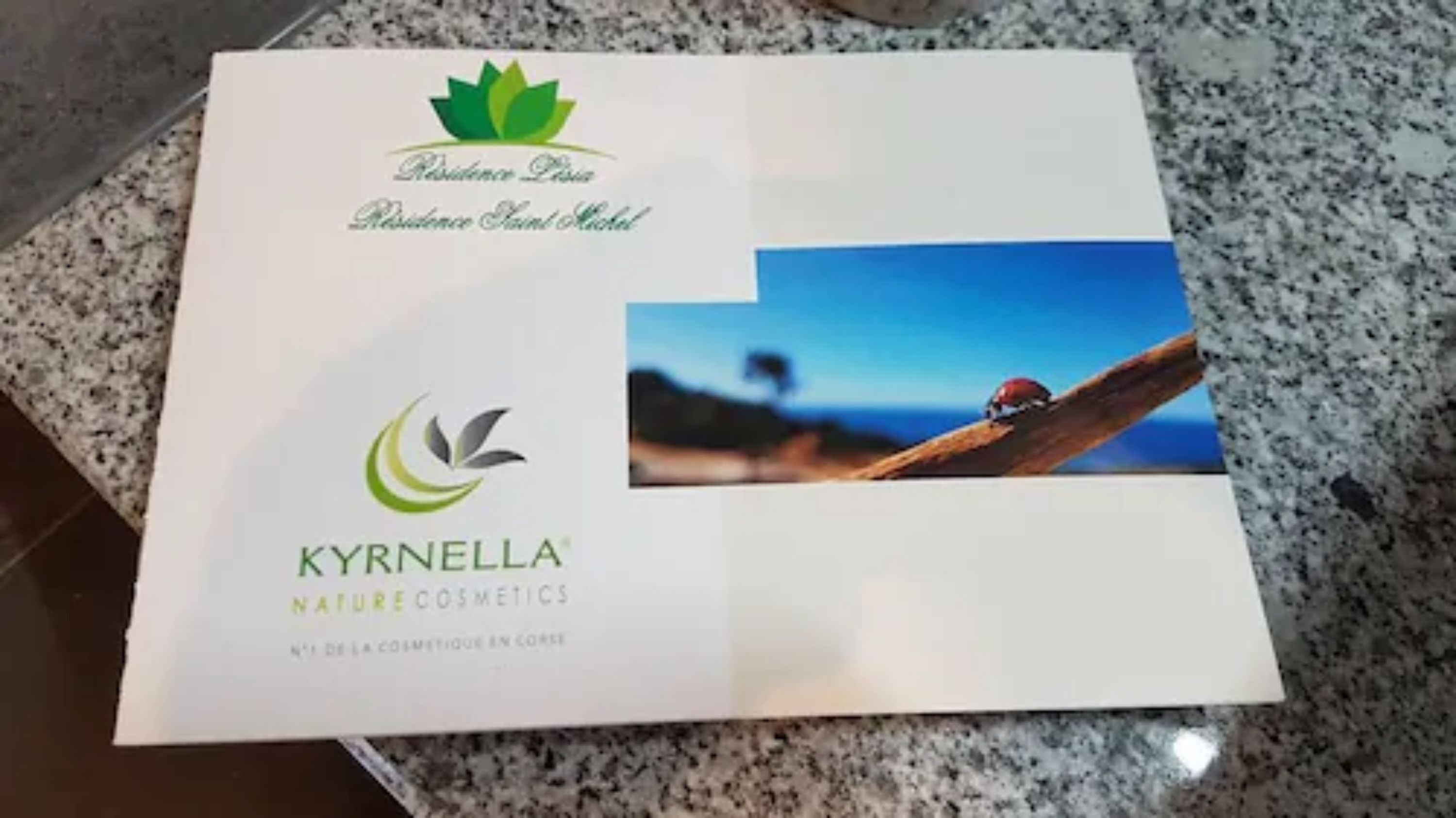 A brochure with a logo and text for 'Kyrnella Nature Cosmetics'.
