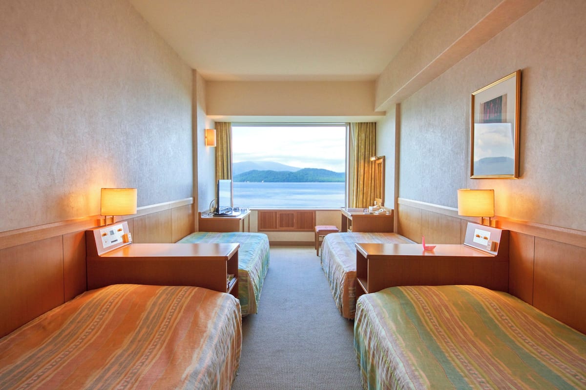 Family Room, Non Smoking | In-room safe, free WiFi, bed sheets