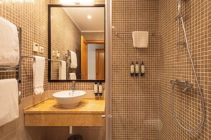 Eco-friendly toiletries, hair dryer, towels