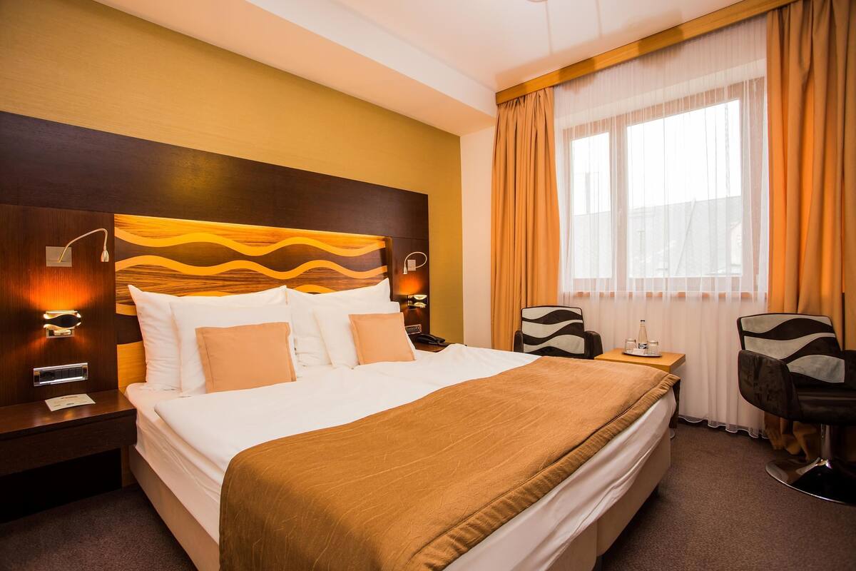 Hypo-allergenic bedding available, memory foam beds, minibar