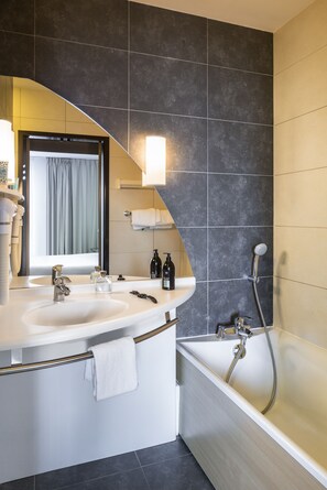 Eco-friendly toiletries, hair dryer, towels