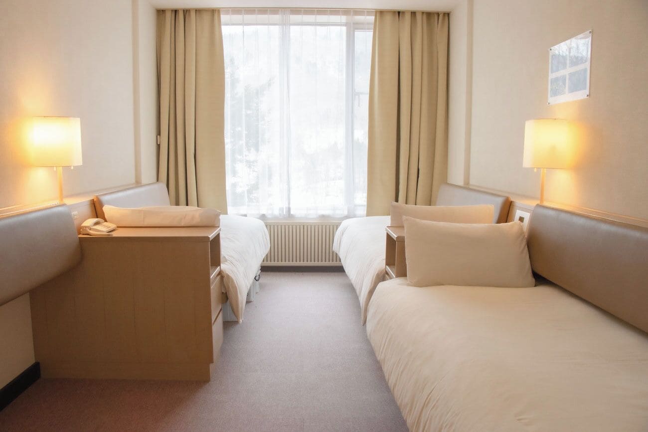 Familiekamer, 3 slaapkamers, niet-roken (West Tower) | Verduisterende gordijnen, beddengoed