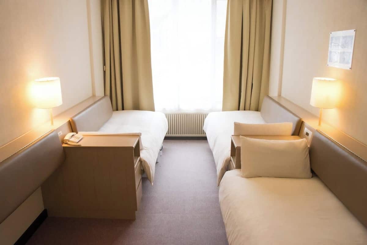 Familienzimmer, 3 Schlafzimmer, Nichtraucher (West Tower) | Verdunkelungsvorhänge, Bettwäsche