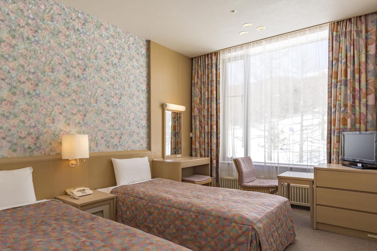 Zweibettzimmer, Nichtraucher (West Tower Twin D) | Verdunkelungsvorhänge, Bettwäsche