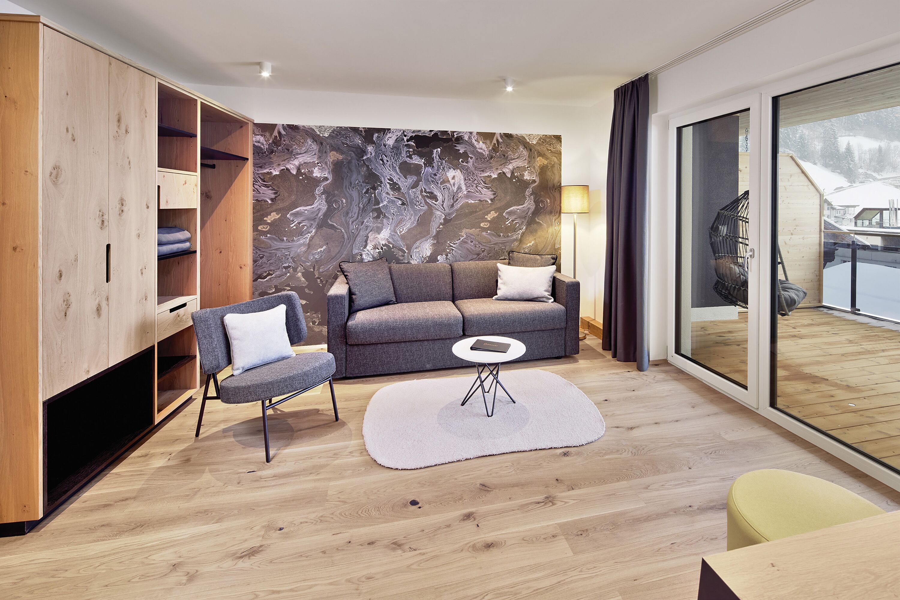 classic suite | living area | 40-inch flat-screen tv with satellite channels, tv, heated floors