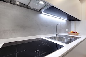 Suite, 1 lit double et 1 canapé-lit | Cuisine privée