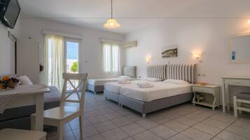 Habitación cuádruple | Sábanas de algodón egipcio, ropa de cama hipoalergénica y edredón