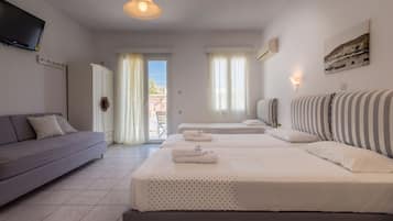 Quadruple Room | Egyptian cotton sheets, hypo-allergenic bedding, down comforters