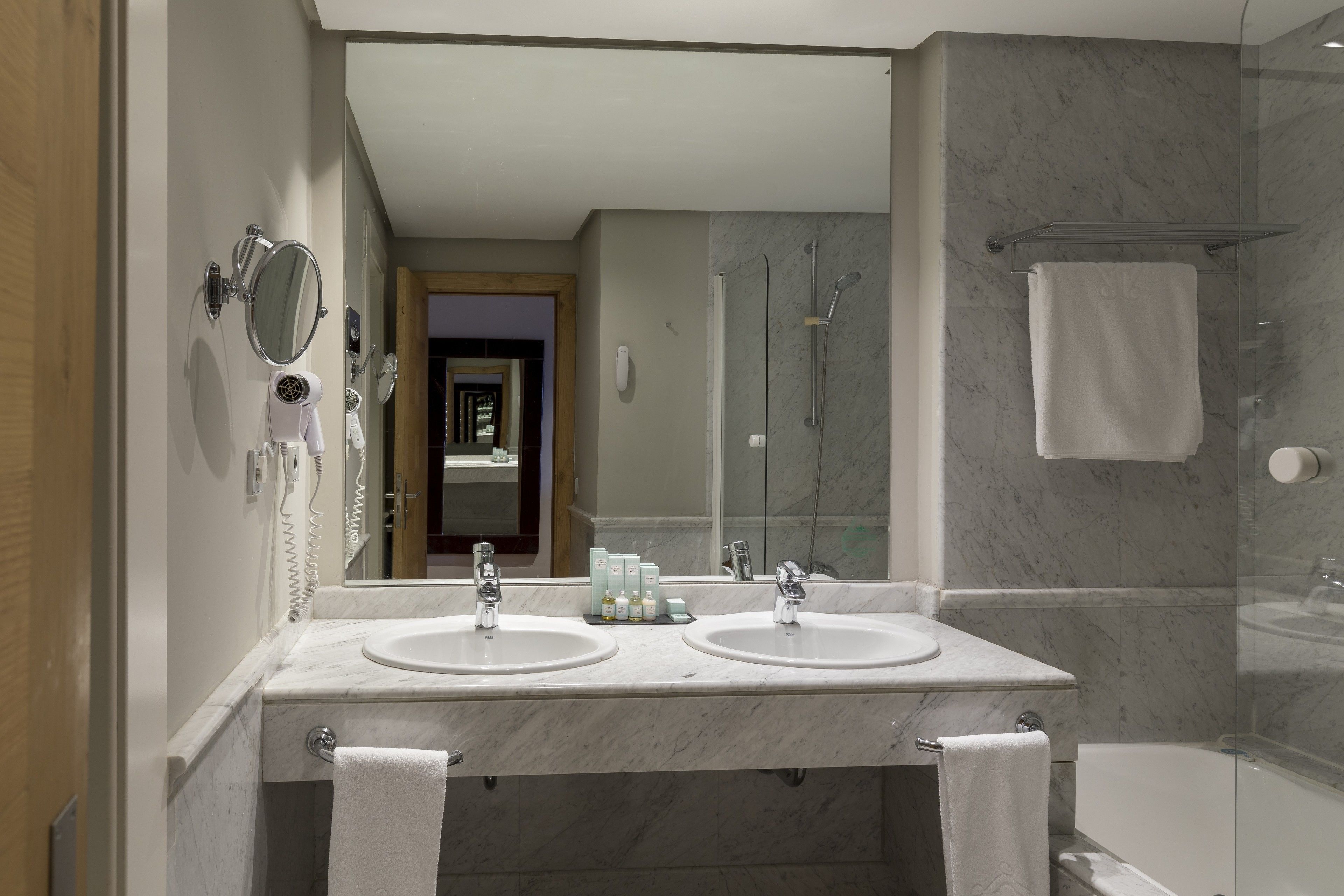 eco-friendly toiletries, hair dryer, bidet, towels