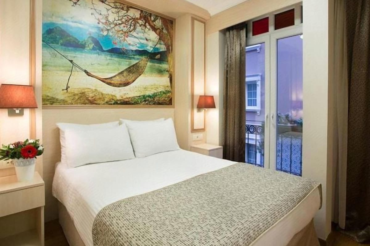 Premium bedding, Select Comfort beds, desk, blackout drapes