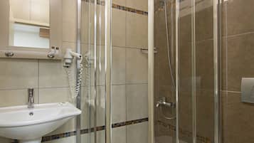 Shower, free toiletries, hair dryer, slippers