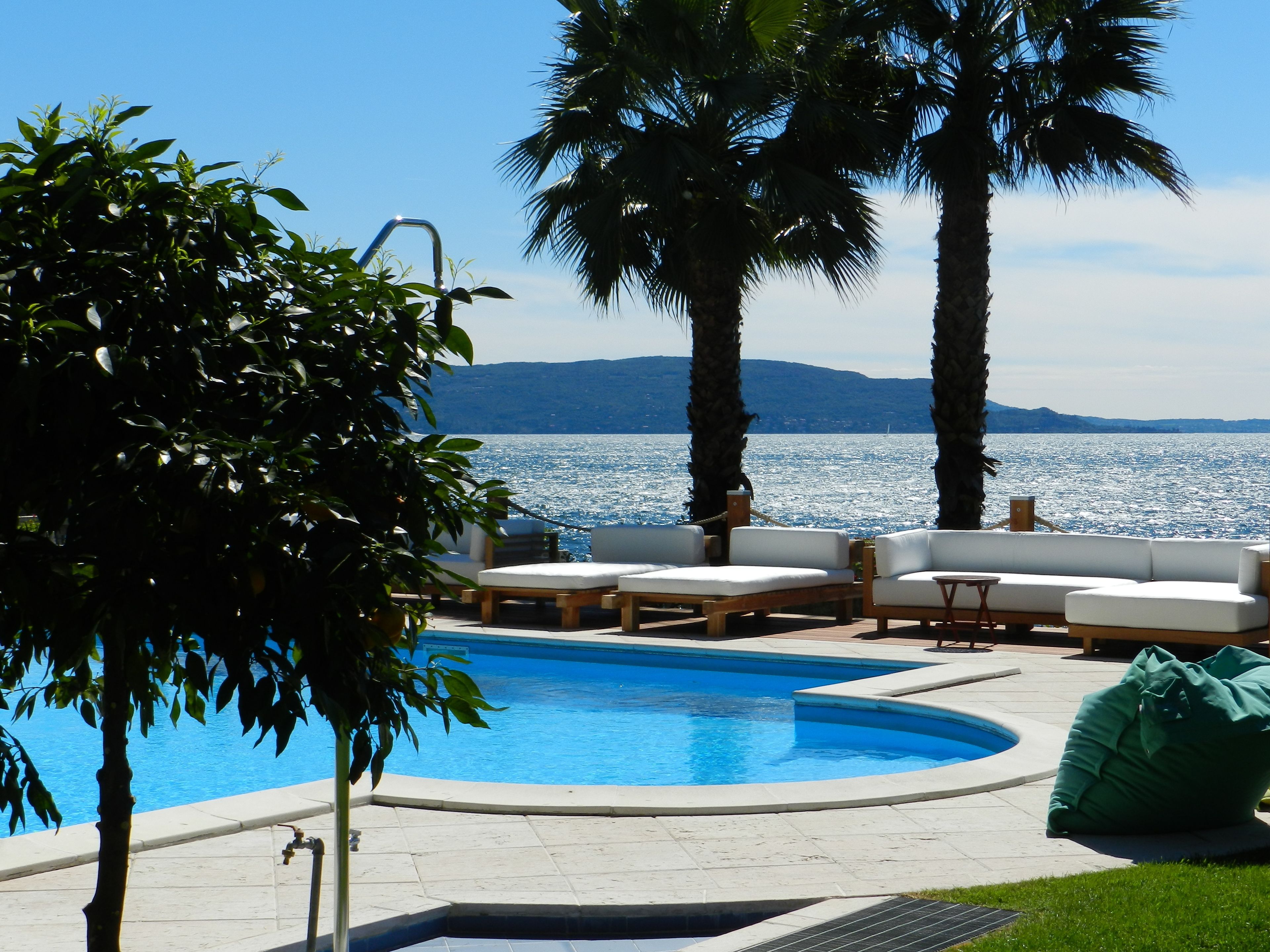 outdoor pool, open 8:00 am to 8:00 pm, pool loungers