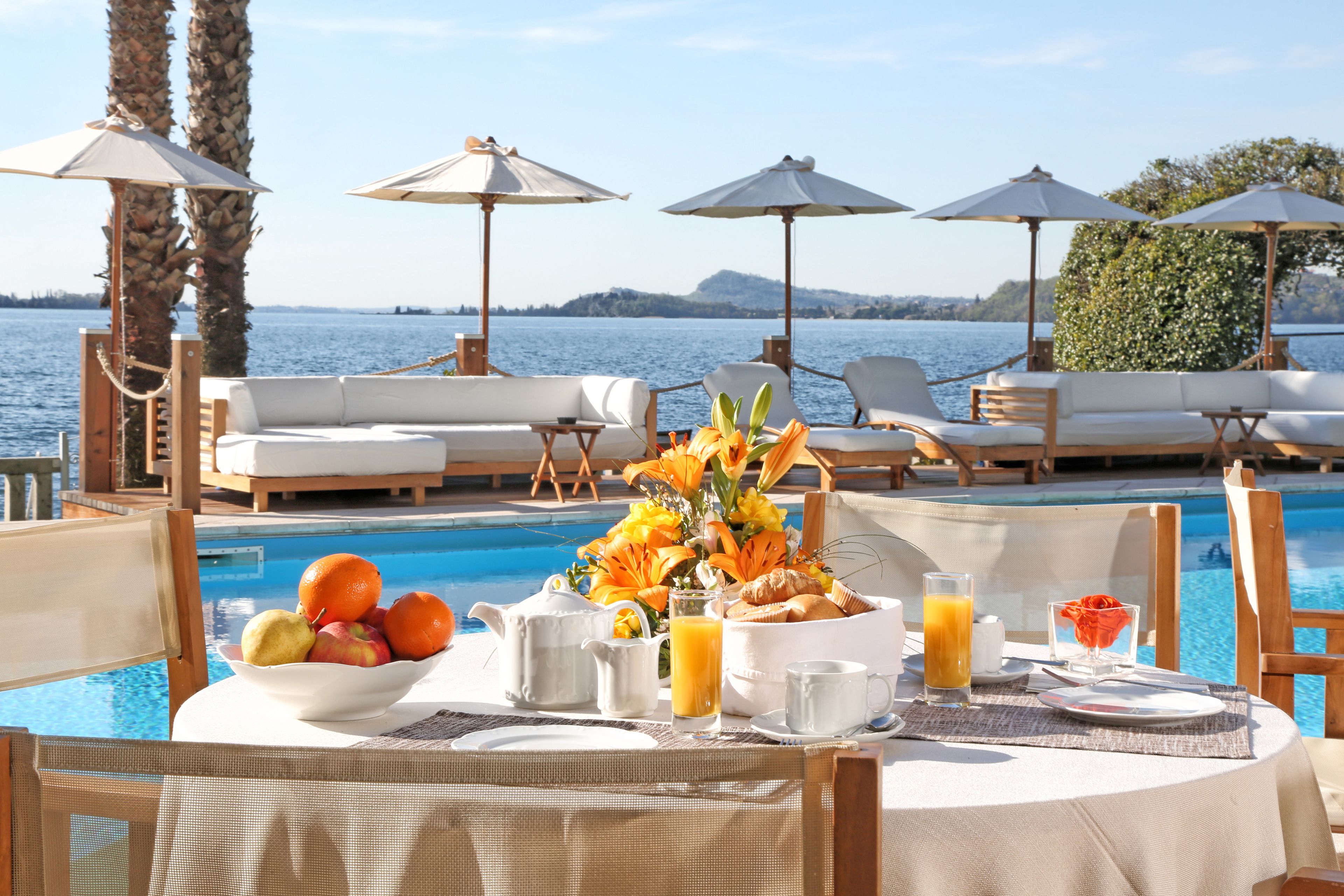 outdoor pool, open 8:00 am to 8:00 pm, pool loungers