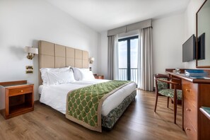 Ropa de cama de alta calidad y minibar 