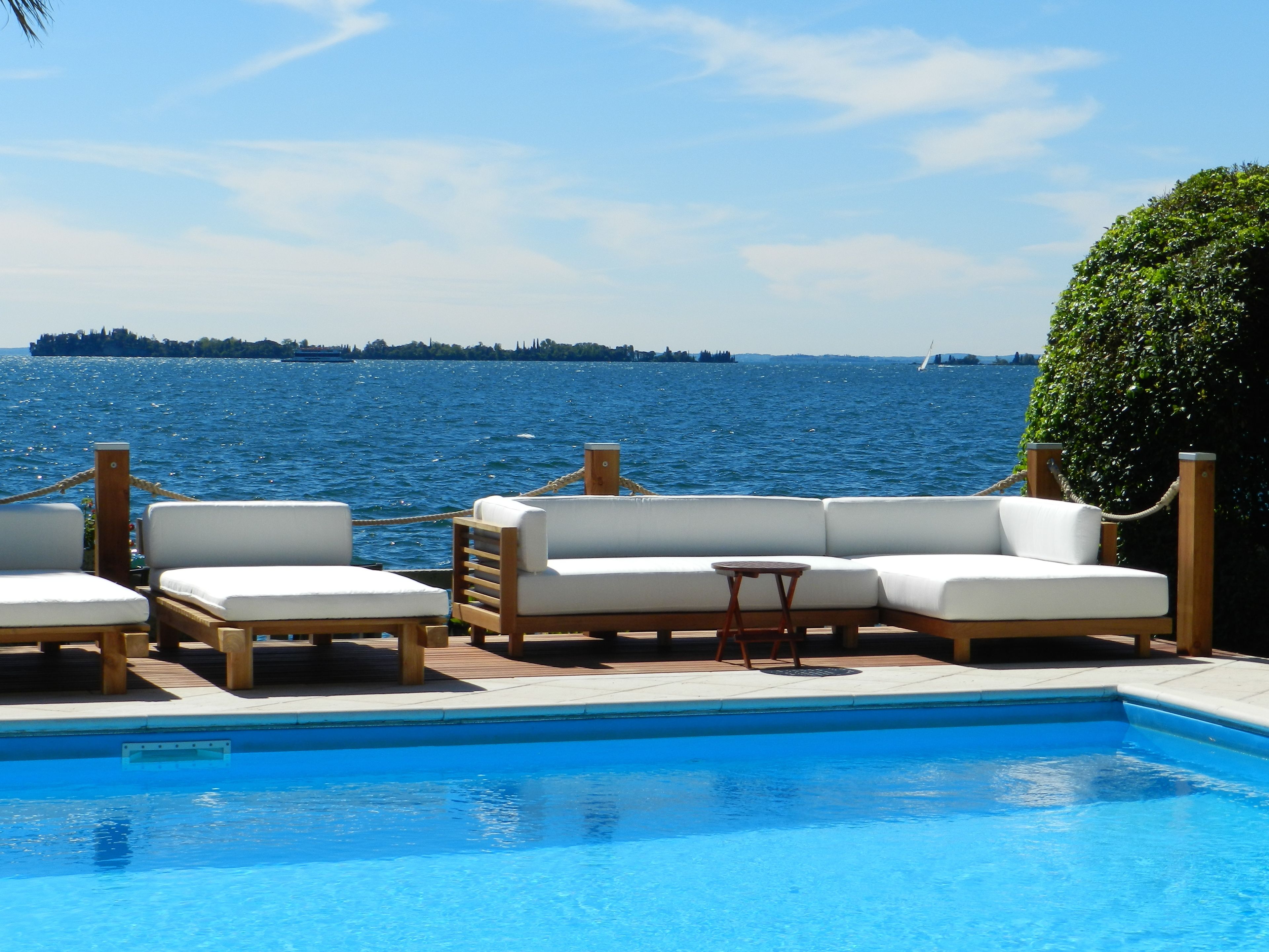 outdoor pool, open 8:00 am to 8:00 pm, pool loungers