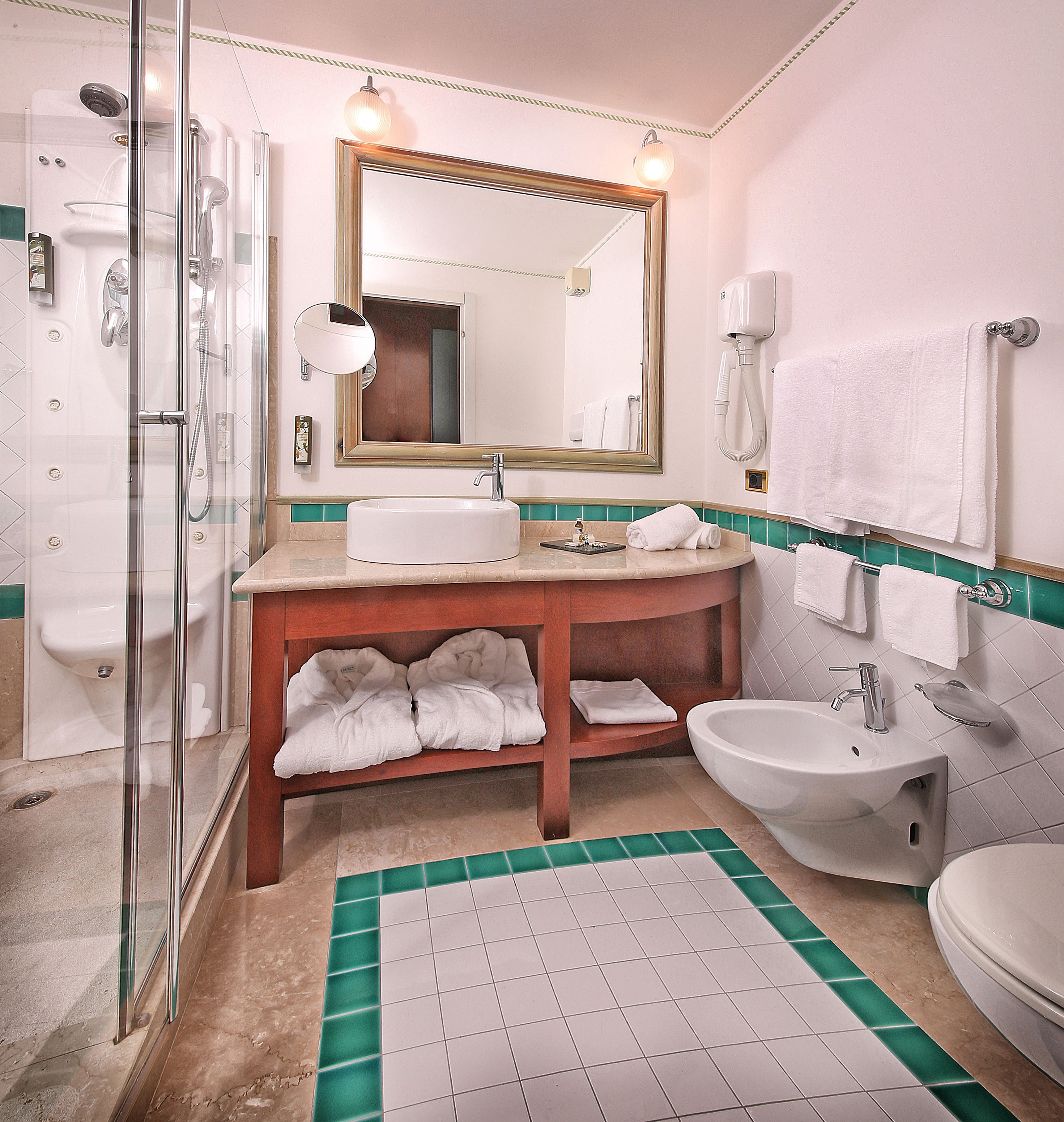 free toiletries, hair dryer, slippers, bidet