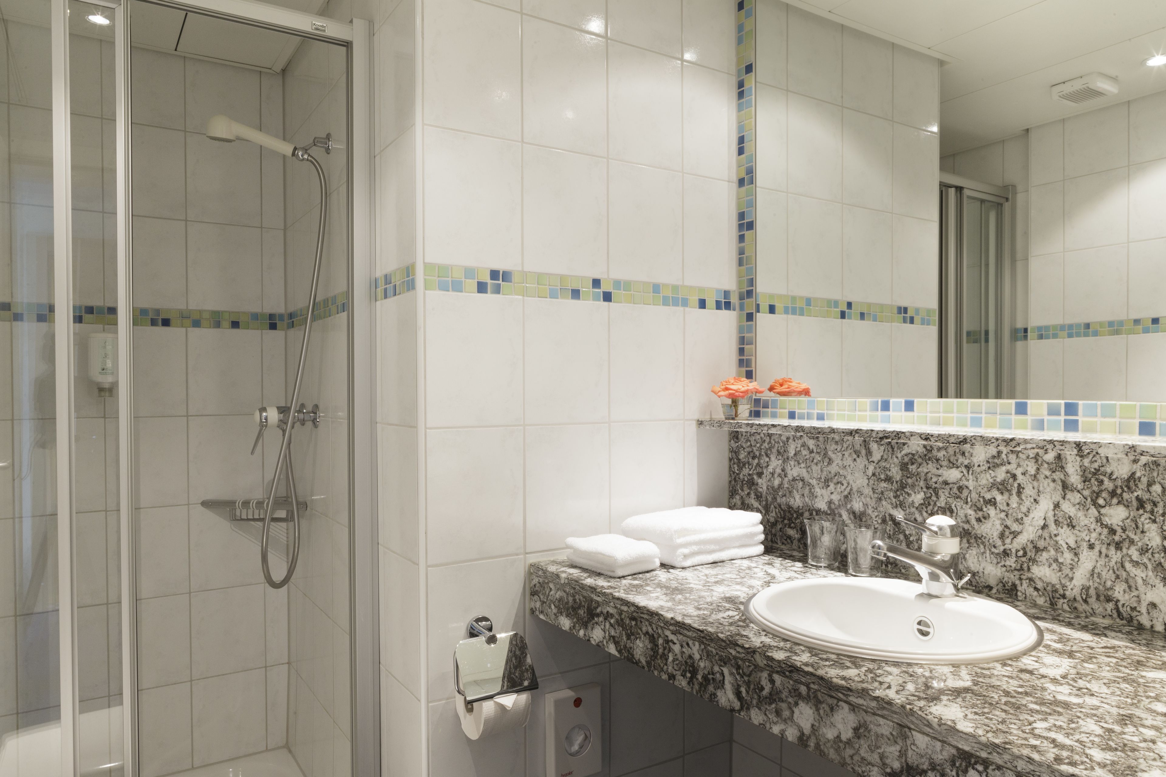 family room | bathroom | shower, hair dryer, bathrobes, slippers