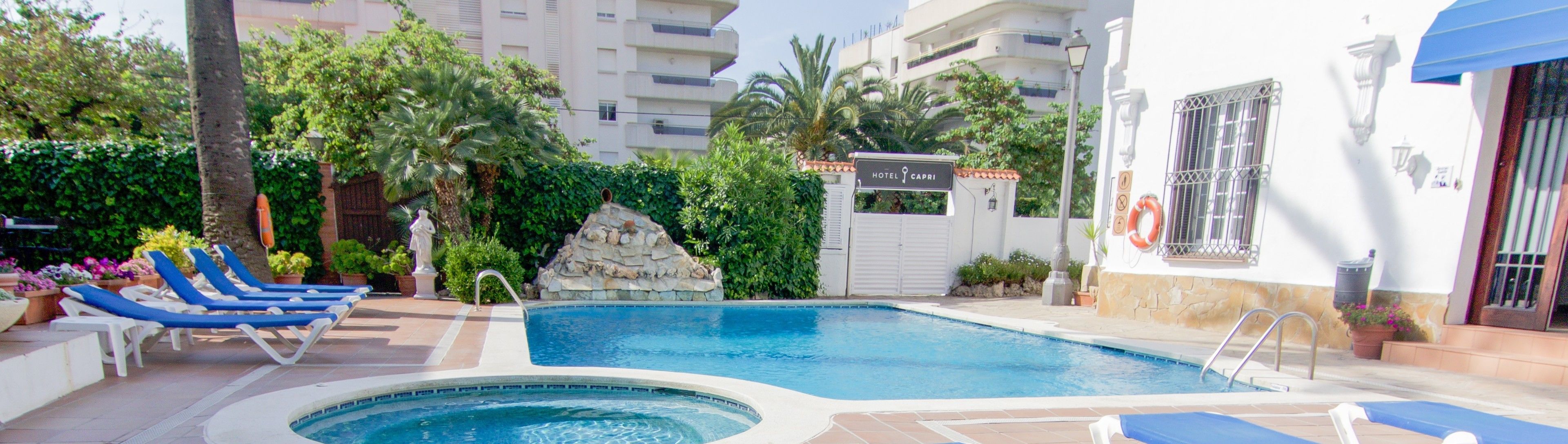 outdoor pool, open 9:00 am to 9:00 pm, pool loungers