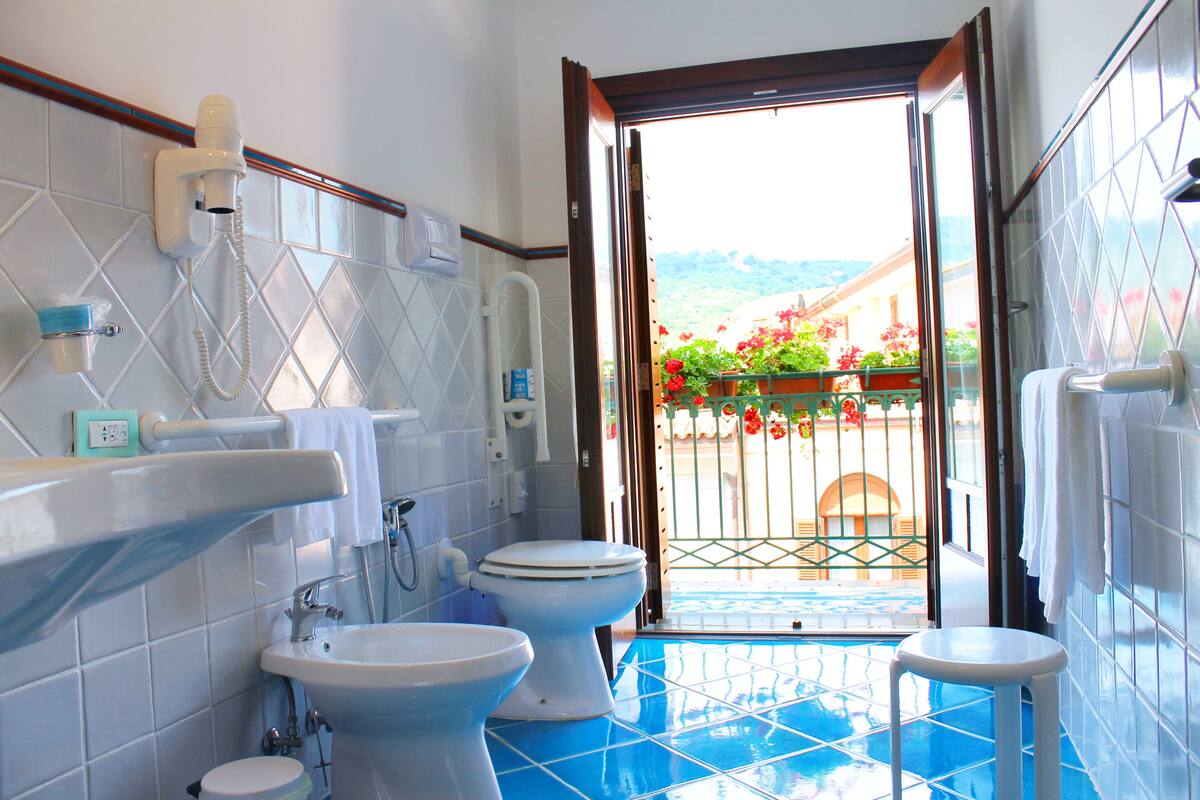 classic double room | bathroom | designer toiletries, hair dryer, bidet, towels