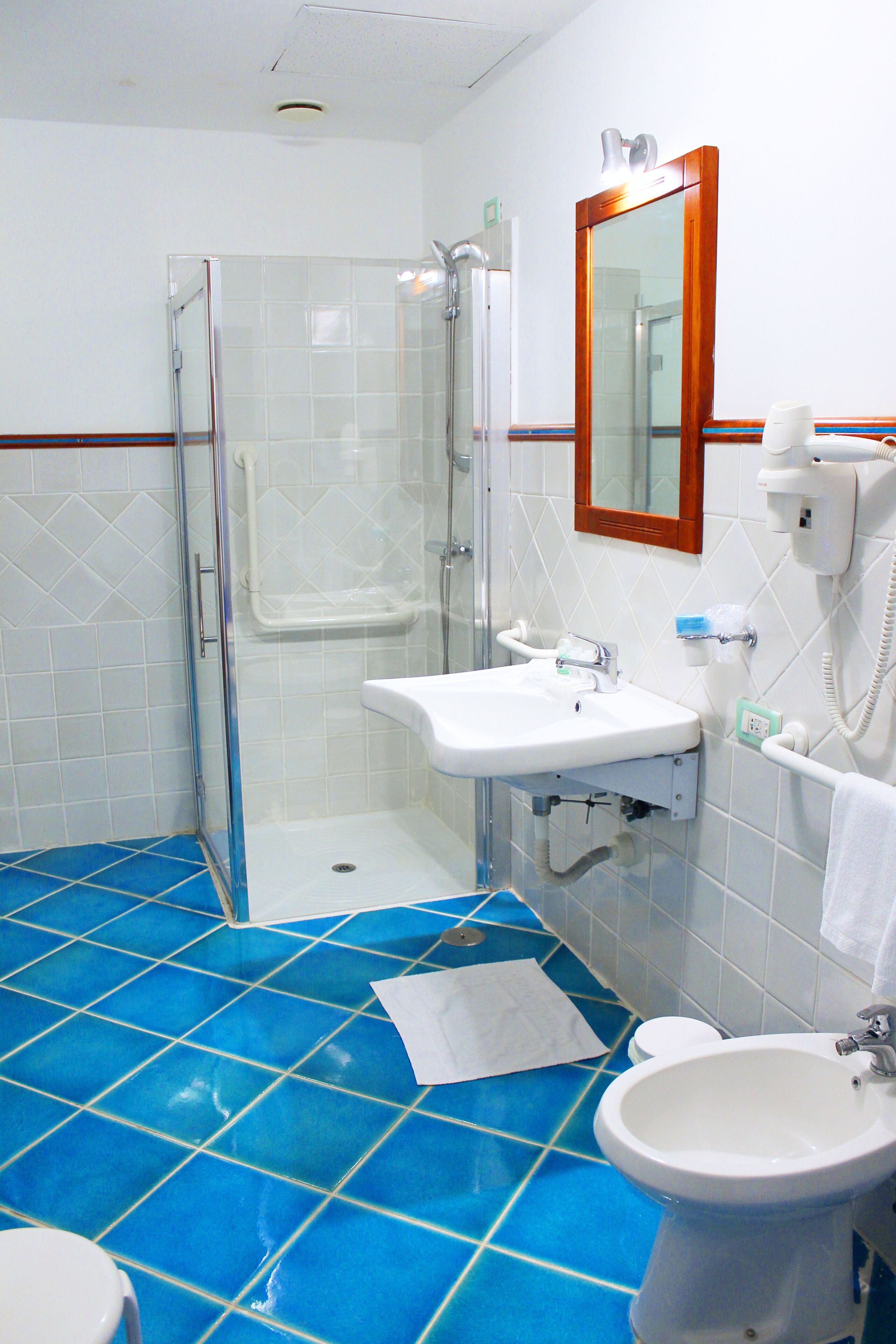 classic double room | bathroom | designer toiletries, hair dryer, bidet, towels