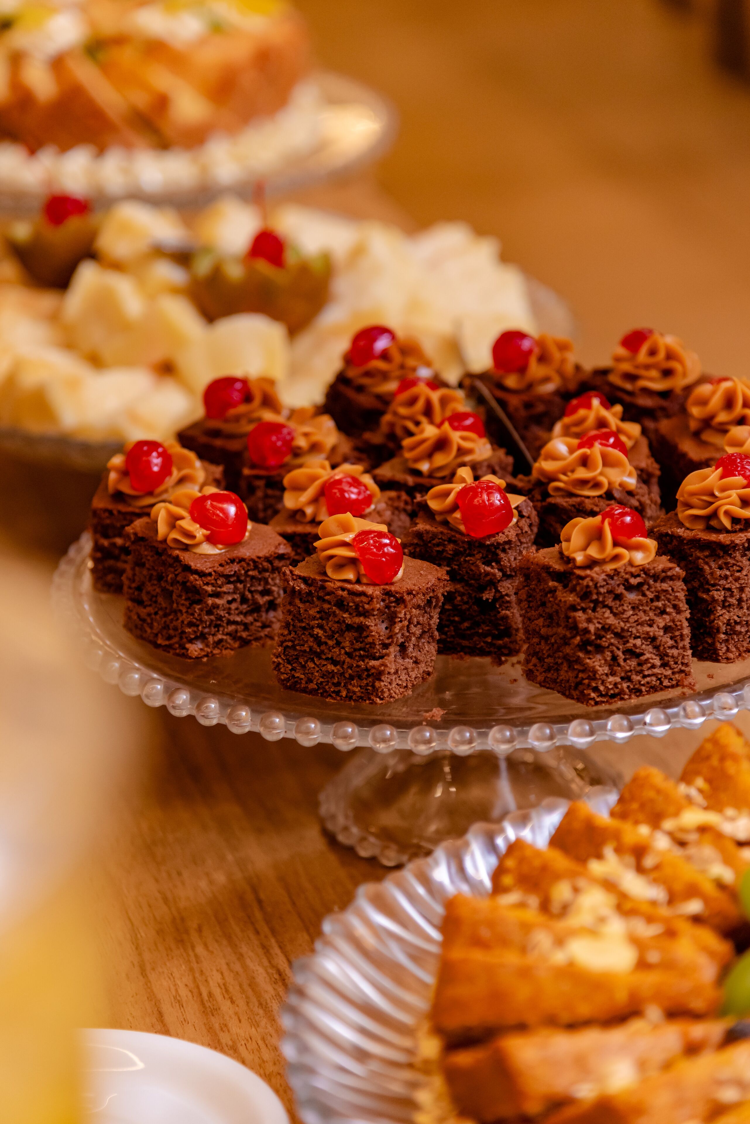 A dessert platter with various cakes and pastries.