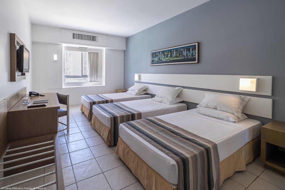 Superior Triple Room, Pool View | 1 bedroom, minibar, in-room safe, desk