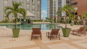 Outdoor pool, pool umbrellas, sun loungers