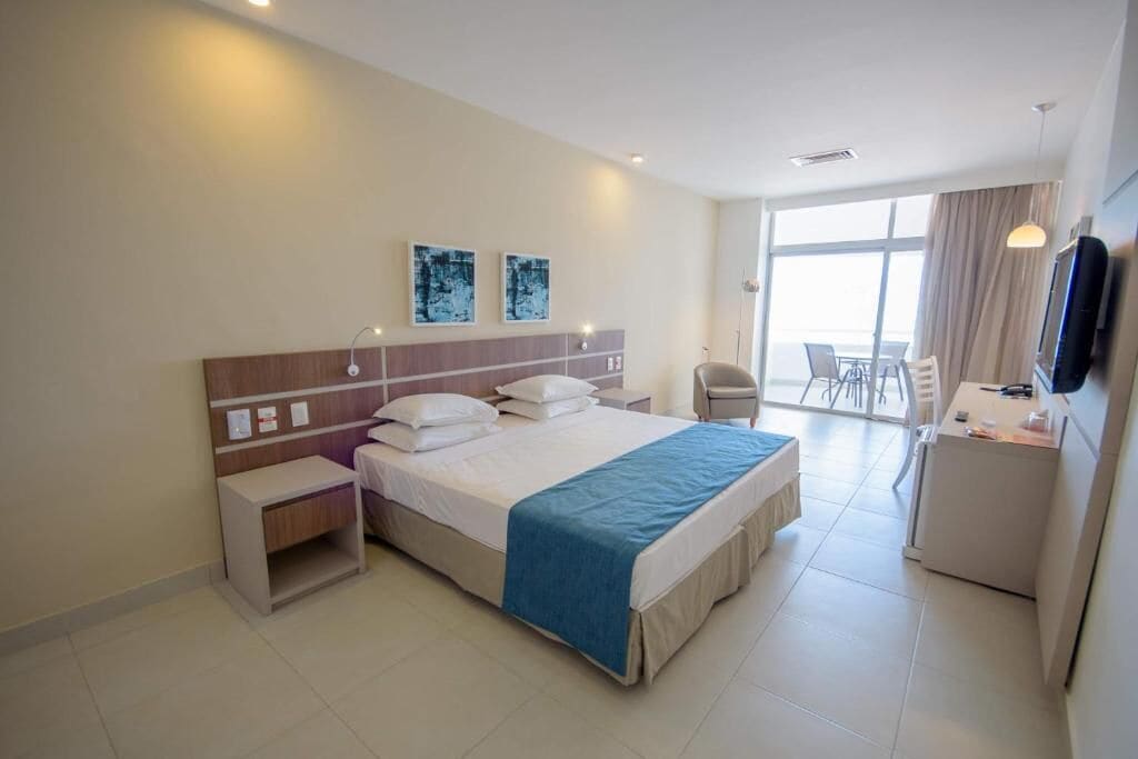 Deluxe Double Room, Lanai, Sea Facing | Minibar, in-room safe, desk, blackout curtains