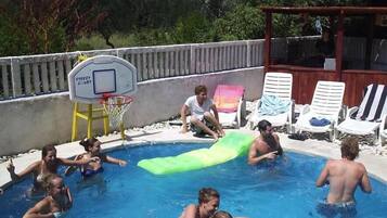 Relax by the pool and enjoy a game of basketball on the outdoor court.