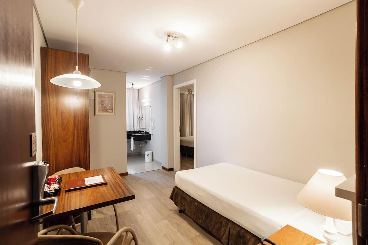 Family Quadruple Room | Hypo-allergenic bedding, minibar, in-room safe, desk