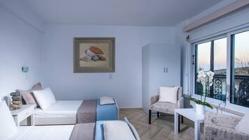 Apartment, 1 Bedroom, Partial Sea View | 1 bedroom, Egyptian cotton sheets, pillowtop beds, in-room safe