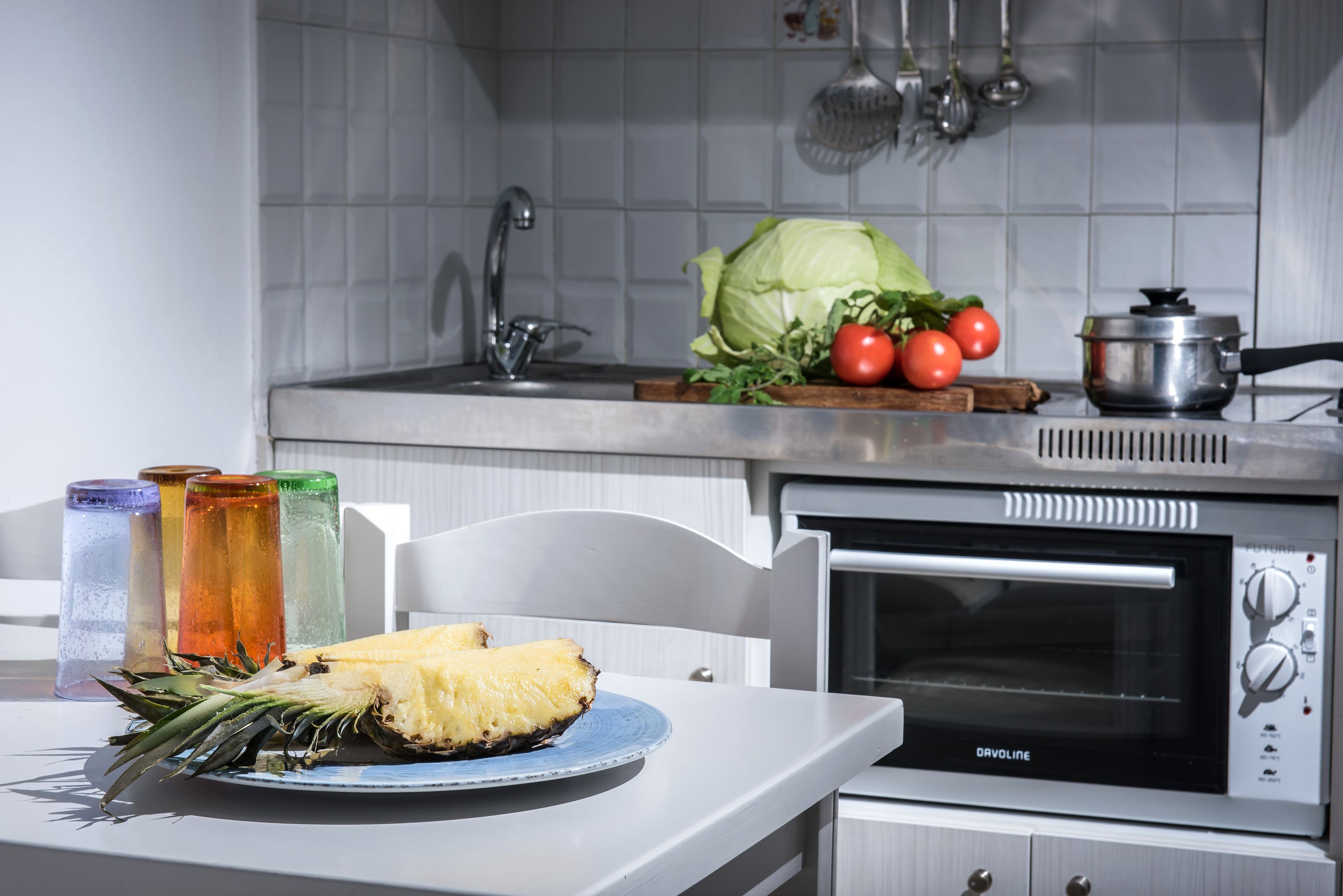 fridge, coffee/tea maker, electric kettle, cookware/dishes/utensils