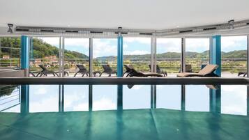Indoor pool, seasonal outdoor pool, pool loungers