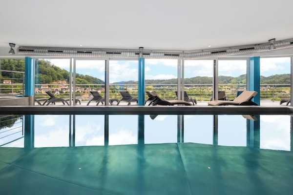 Indoor pool, seasonal outdoor pool, pool loungers