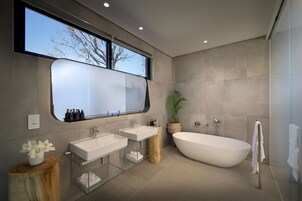 Signature Villa, 2 Bedrooms | Bathroom | Separate tub and shower, rainfall showerhead, designer toiletries
