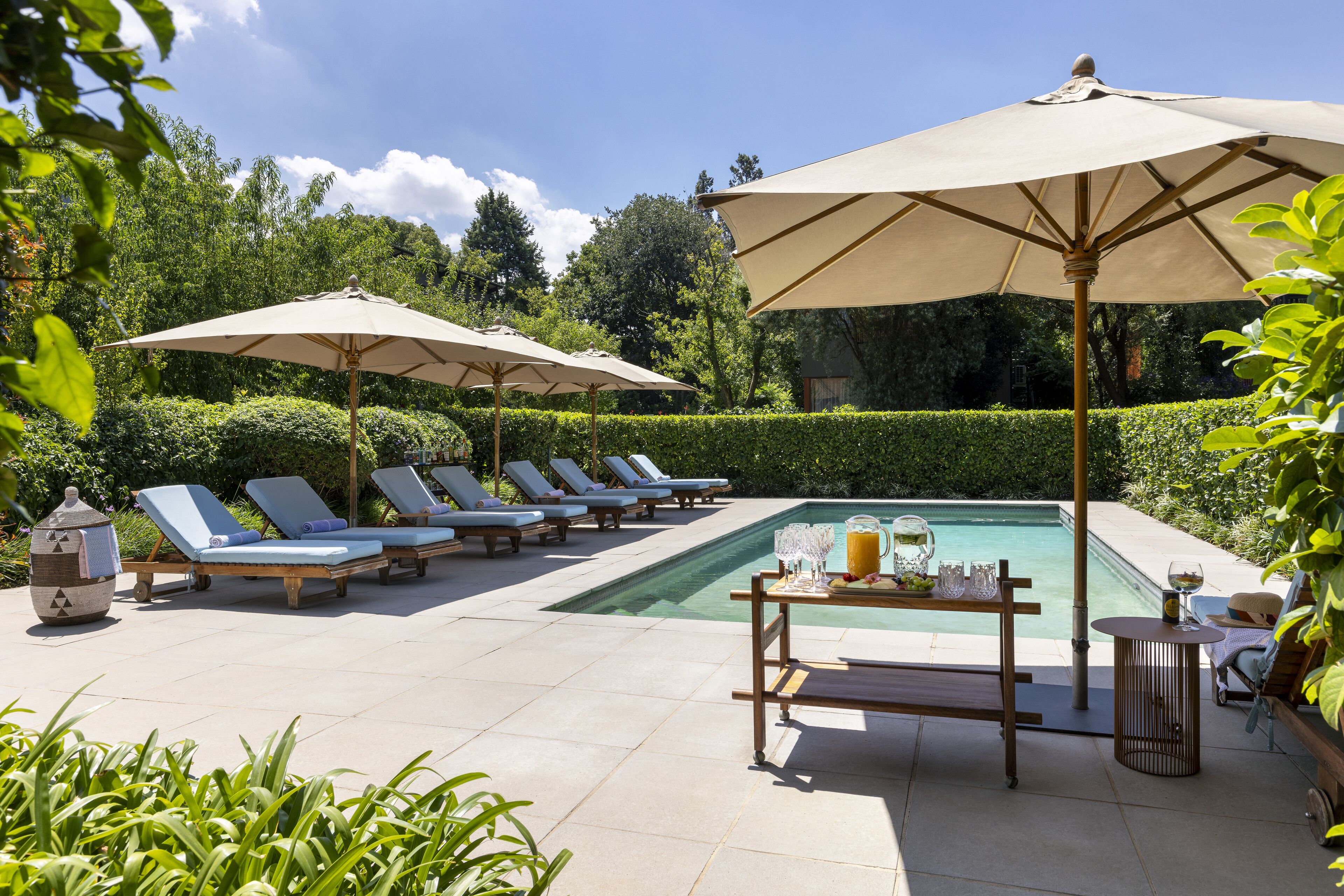2 outdoor pools, pool umbrellas, pool loungers