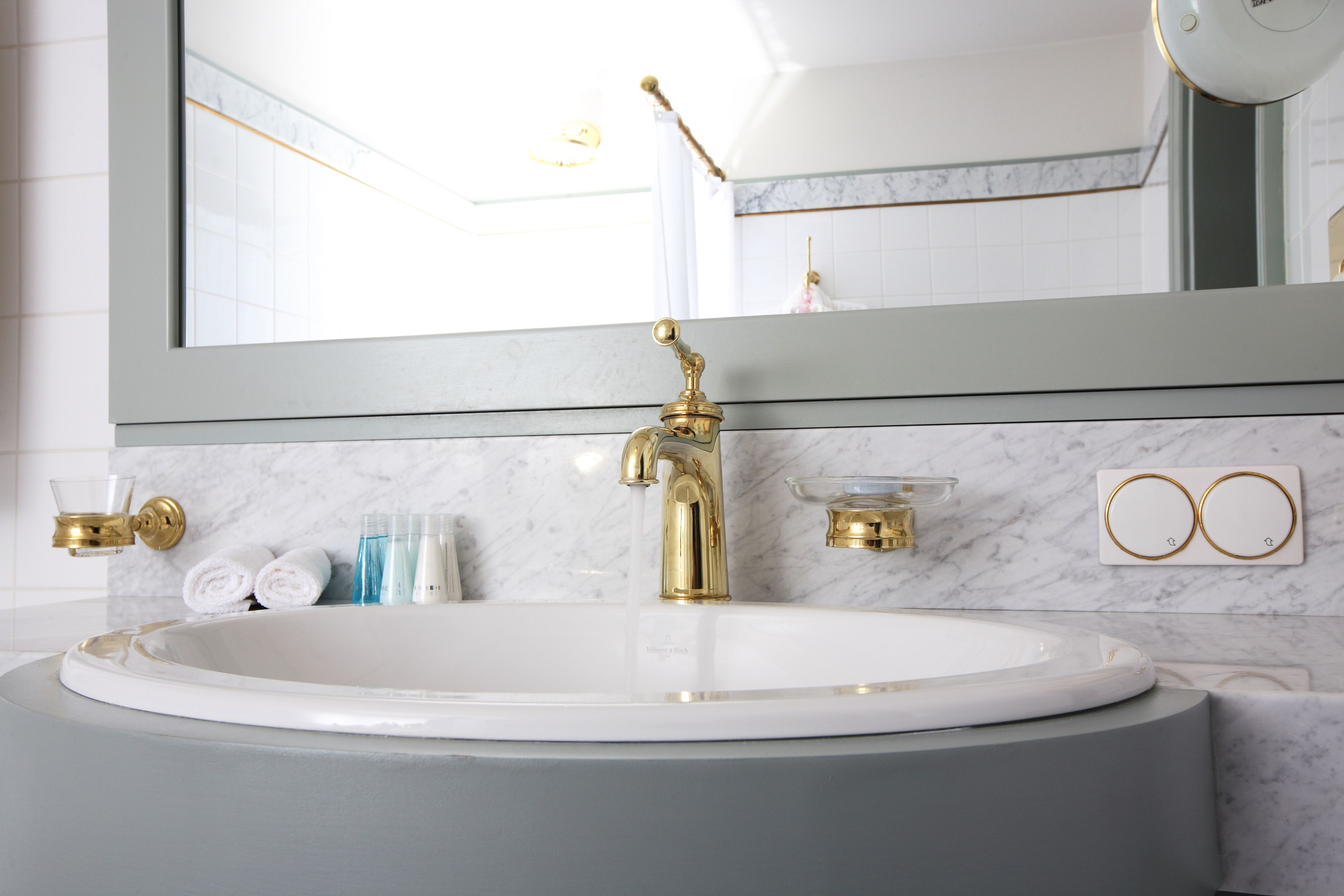 rainfall showerhead, designer toiletries, hair dryer, bathrobes