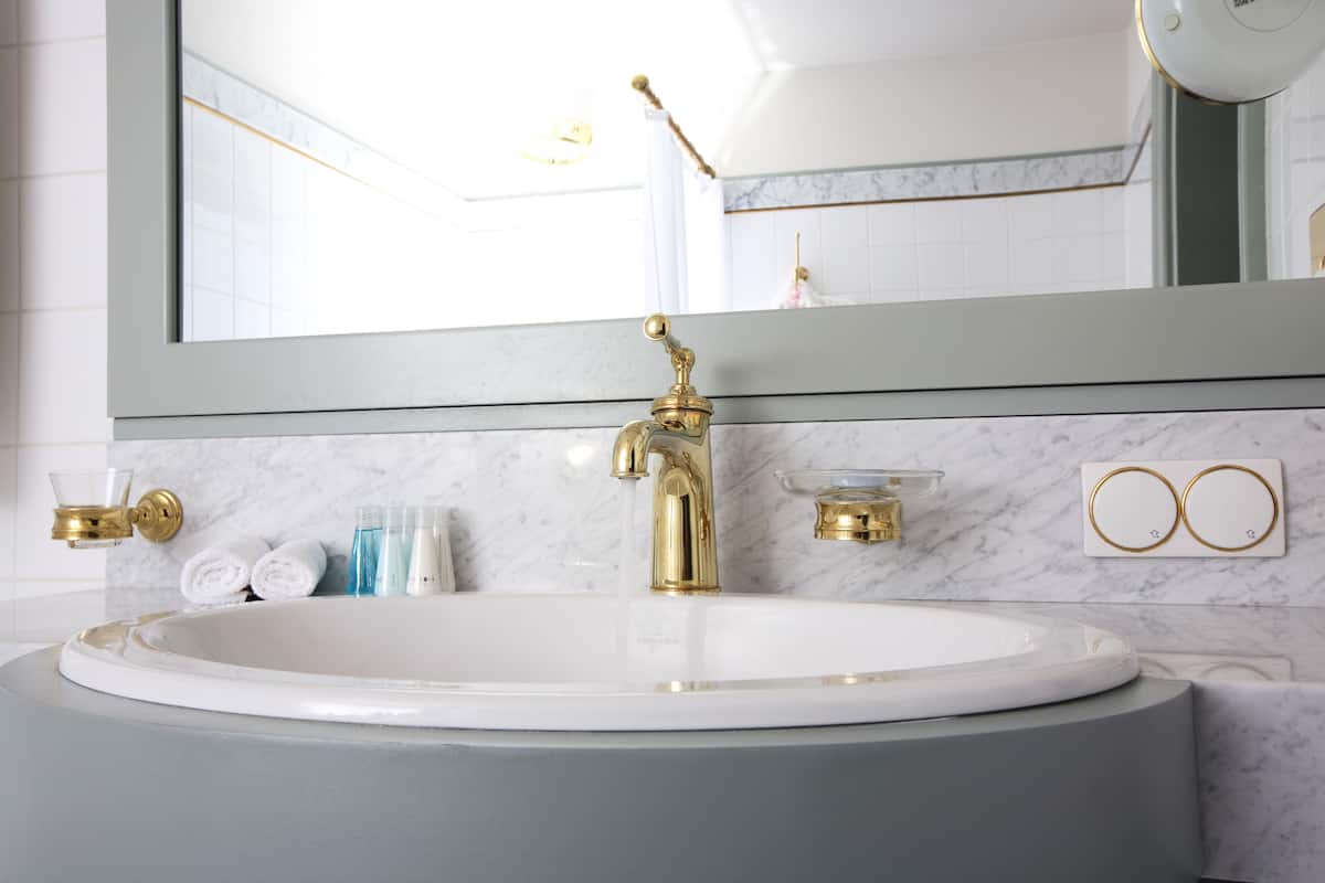 rainfall showerhead, designer toiletries, hair dryer, bathrobes