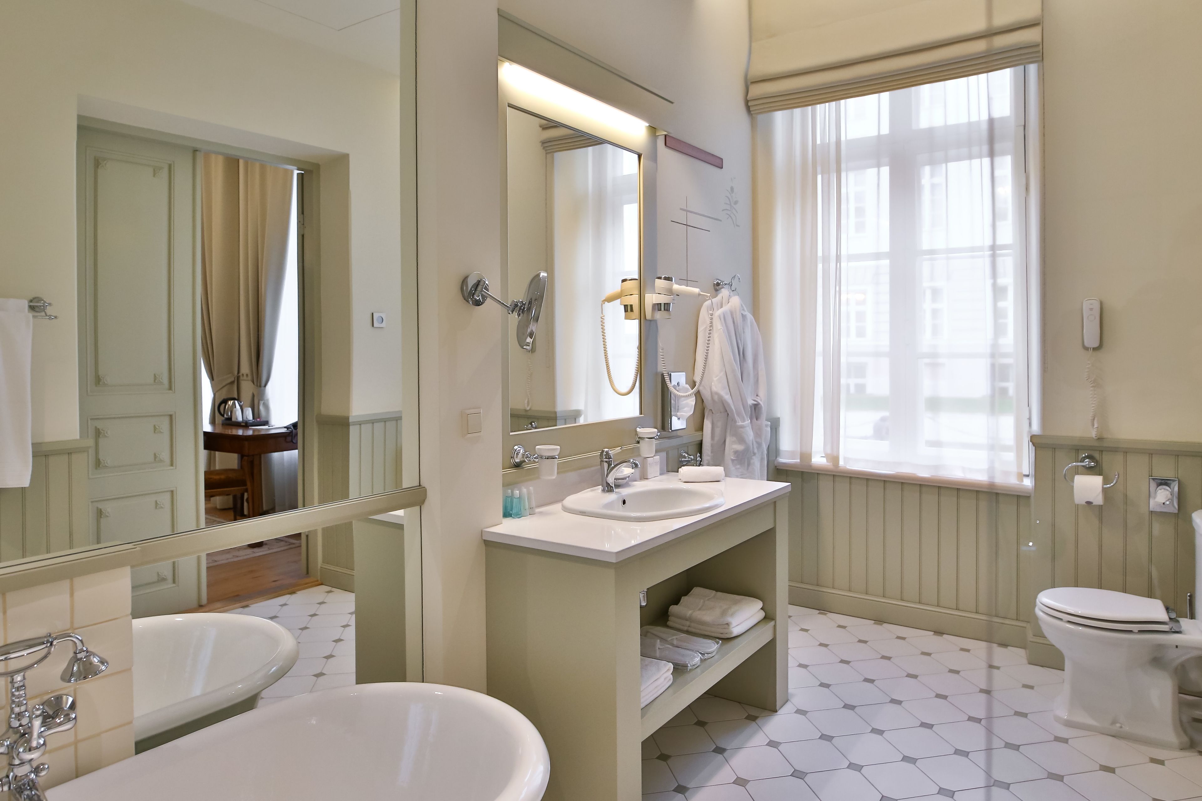 rainfall showerhead, designer toiletries, hair dryer, bathrobes