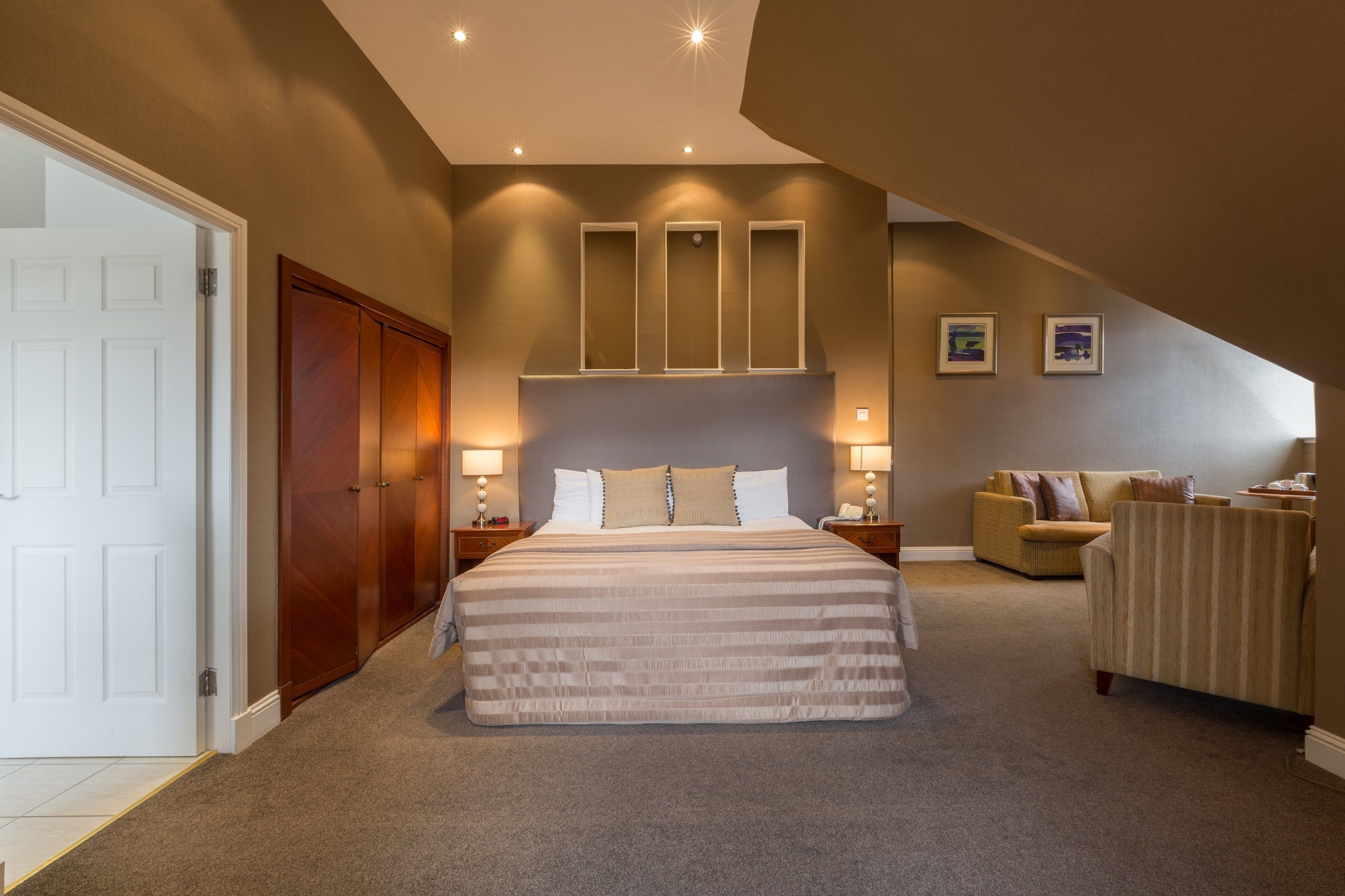 junior suite | premium bedding, desk, soundproofing, iron/ironing board