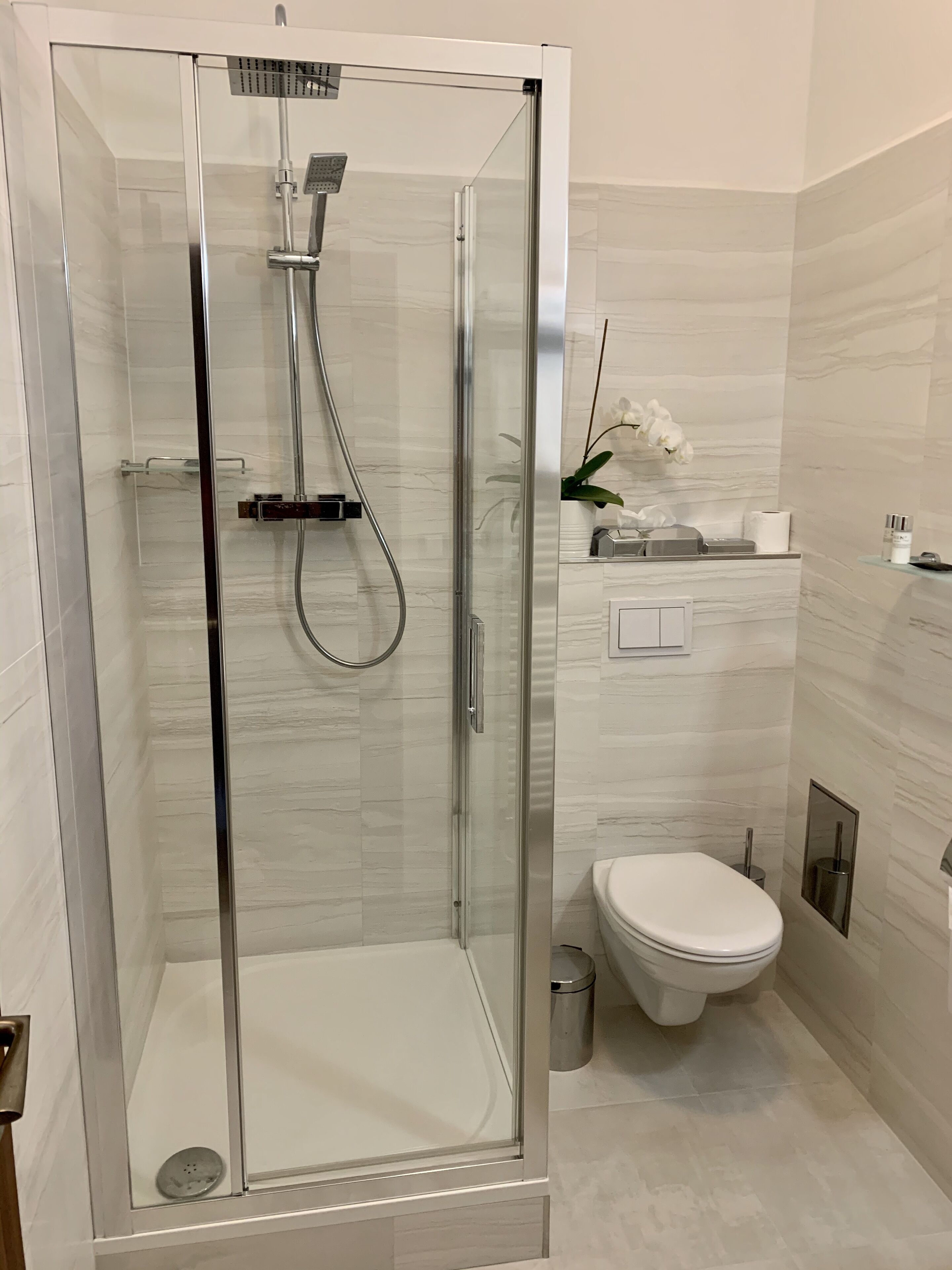 superior double room | bathroom | shower, free toiletries, hair dryer, towels