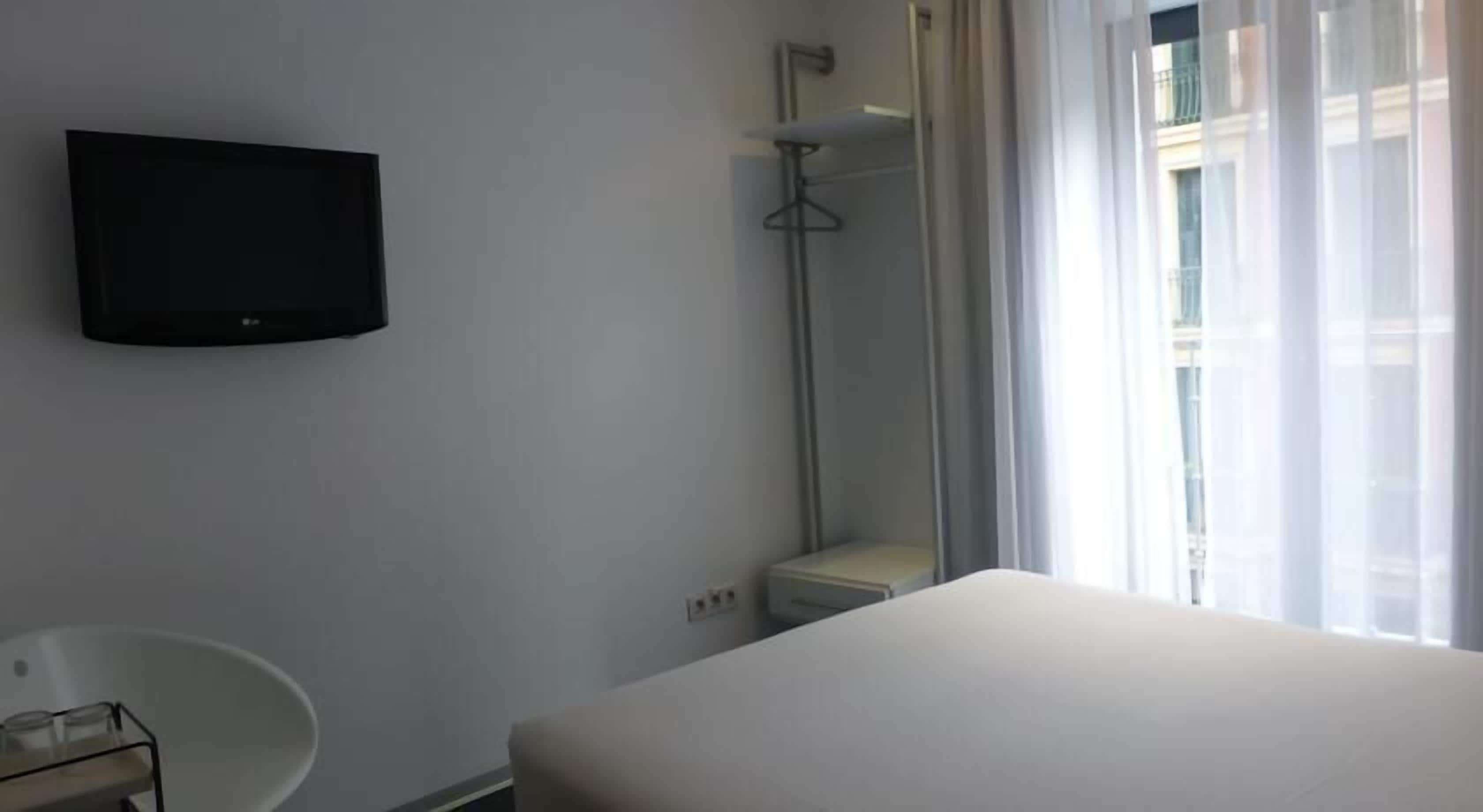 Down comforters, blackout drapes, iron/ironing board, free WiFi