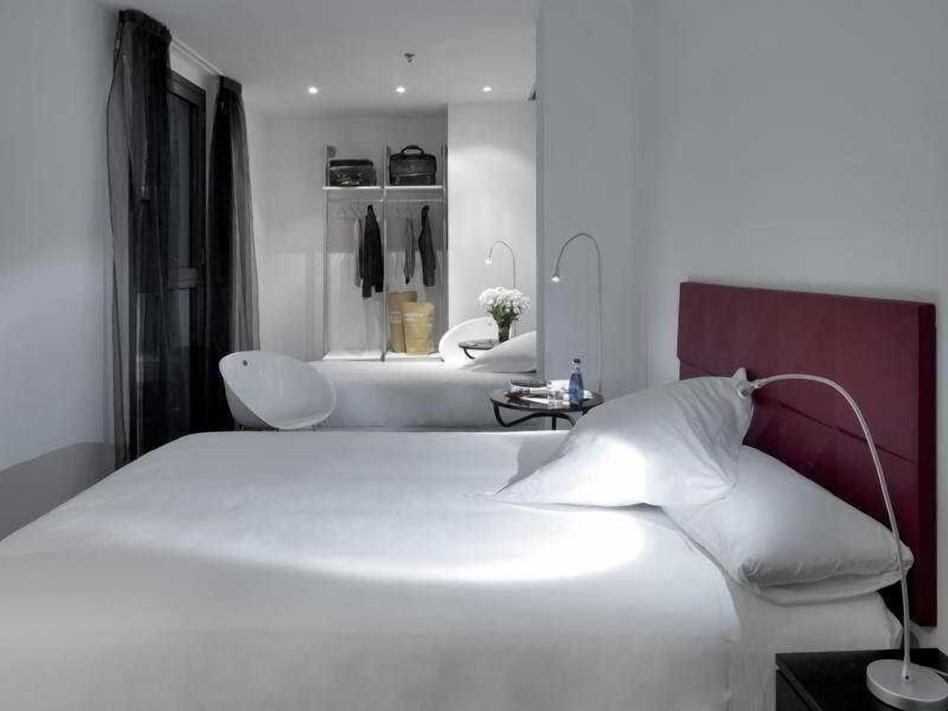 Down comforters, blackout drapes, iron/ironing board, free WiFi