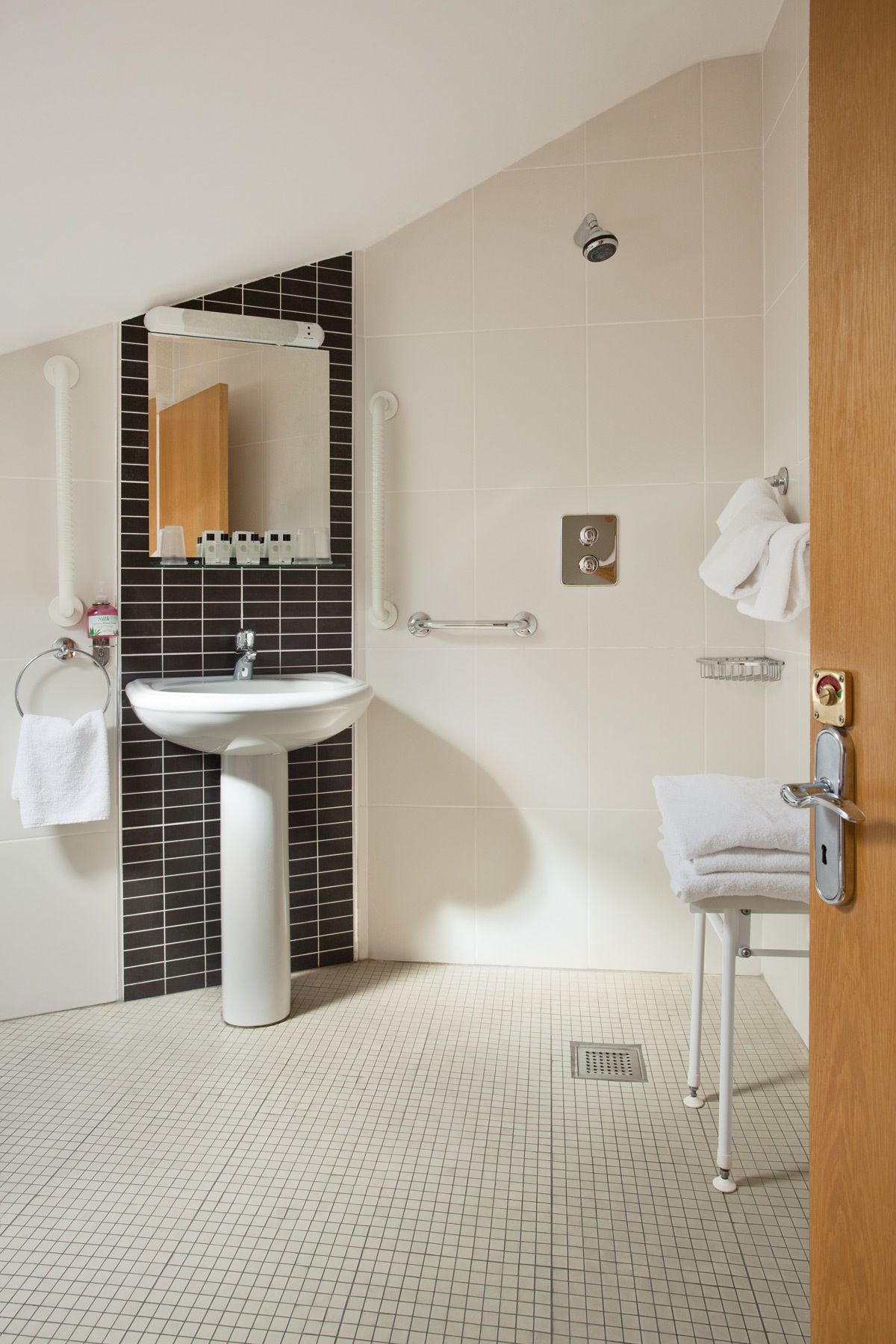 family room | bathroom | combined shower/bathtub, deep-soaking bathtub, free toiletries