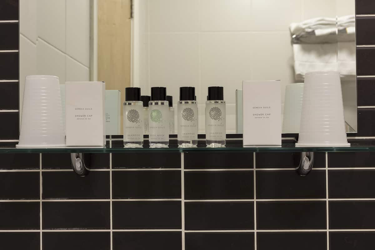 combined shower/bathtub, deep-soaking bathtub, free toiletries