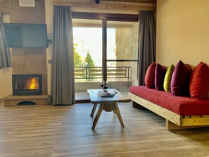 Honeymoon Apartment | Living area | 45-inch LED TV with satellite channels, TV, fireplace - Faraya Village Club (Faraya)