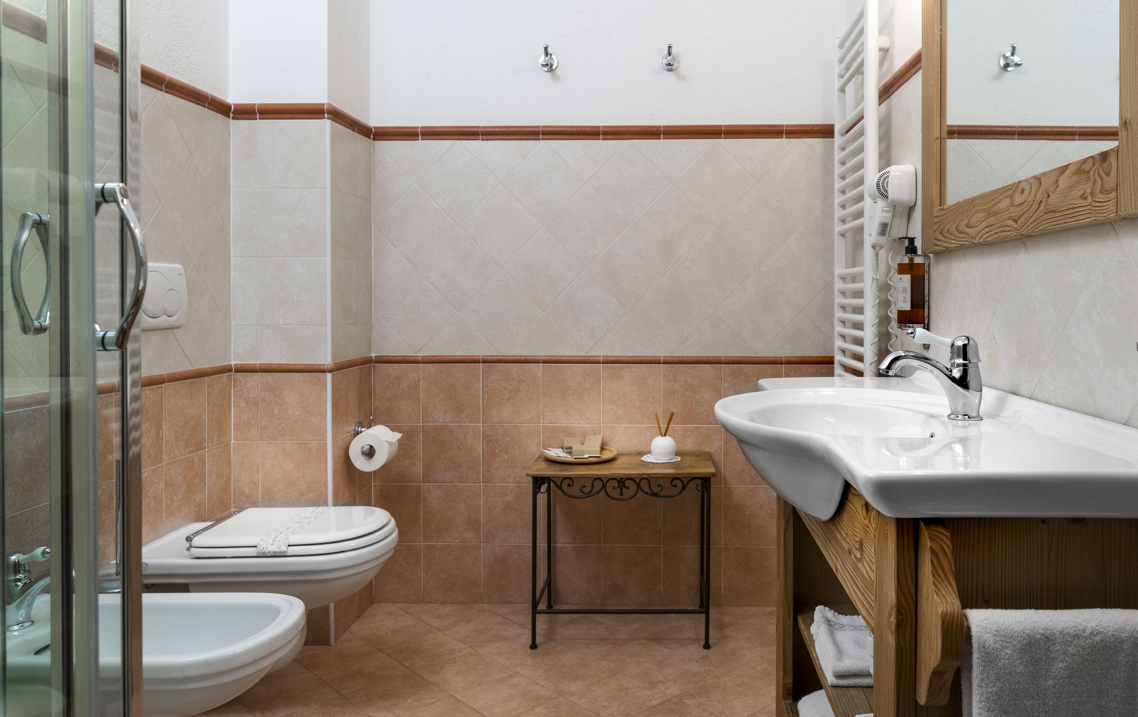 free toiletries, hair dryer, bidet, towels